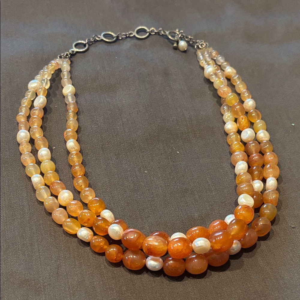 Orange and pink stone necklace with silver detail